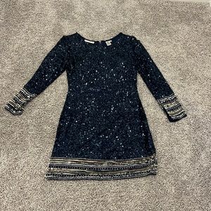 Size 10 long sleeve mid dress all sparkle and beads. Showstopper!